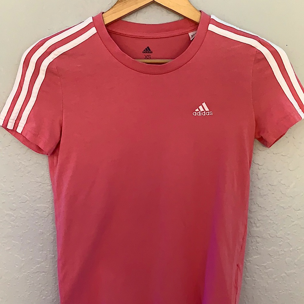 Pink Adidas with stripes on shoulder